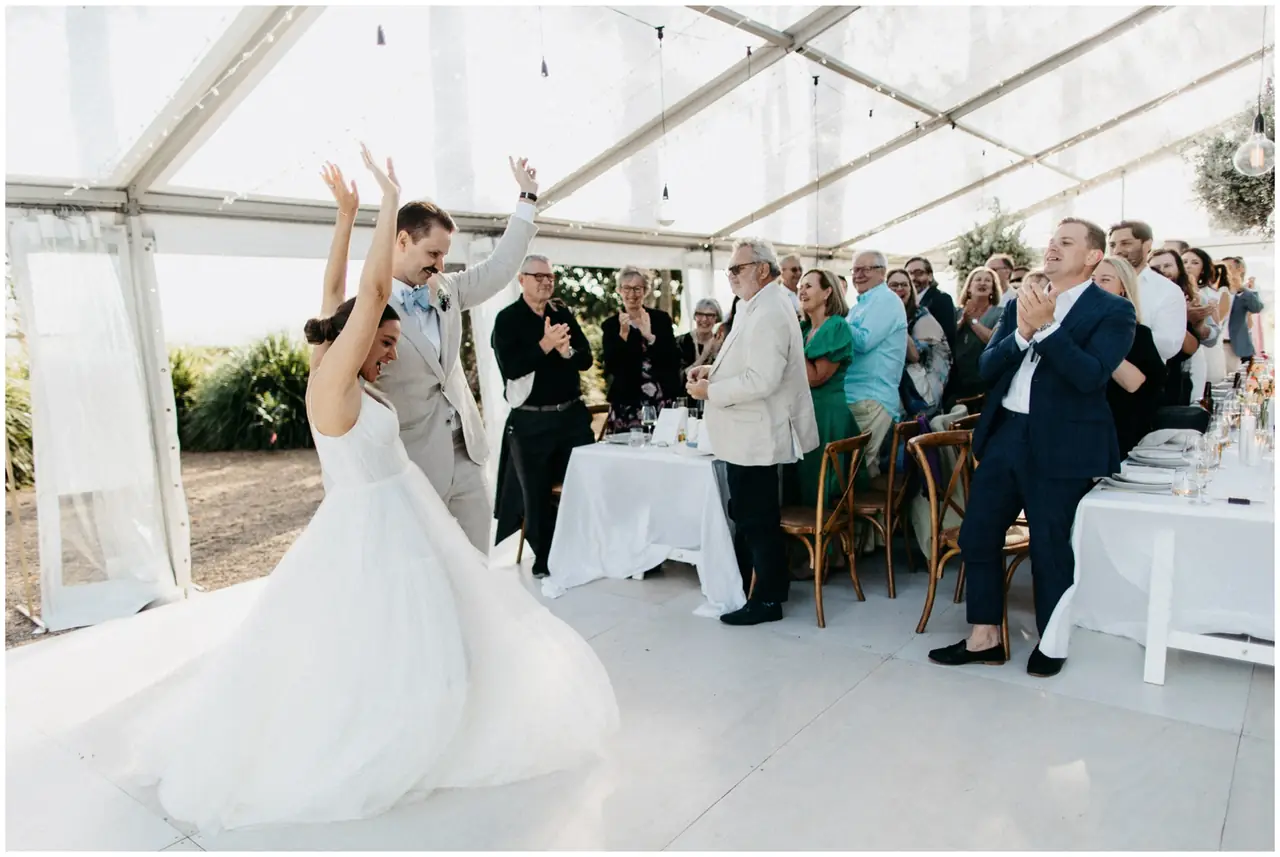 Marty & Nicola at Byron View Farm: The couple celebrate with guests inside the marquee.