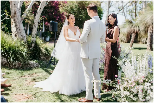 Marty & Nicola at Byron View Farm: The couple exchange vows at their outdoor ceremony.