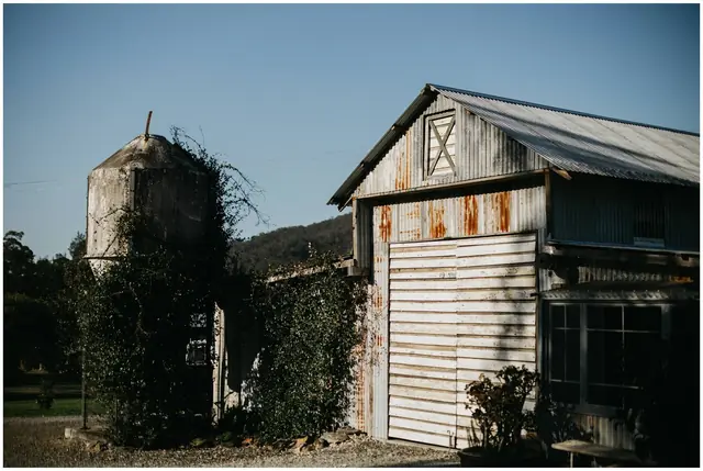 Luke & Cara at Cowbell Creek: Rustic buildings at Cowbell Creek.